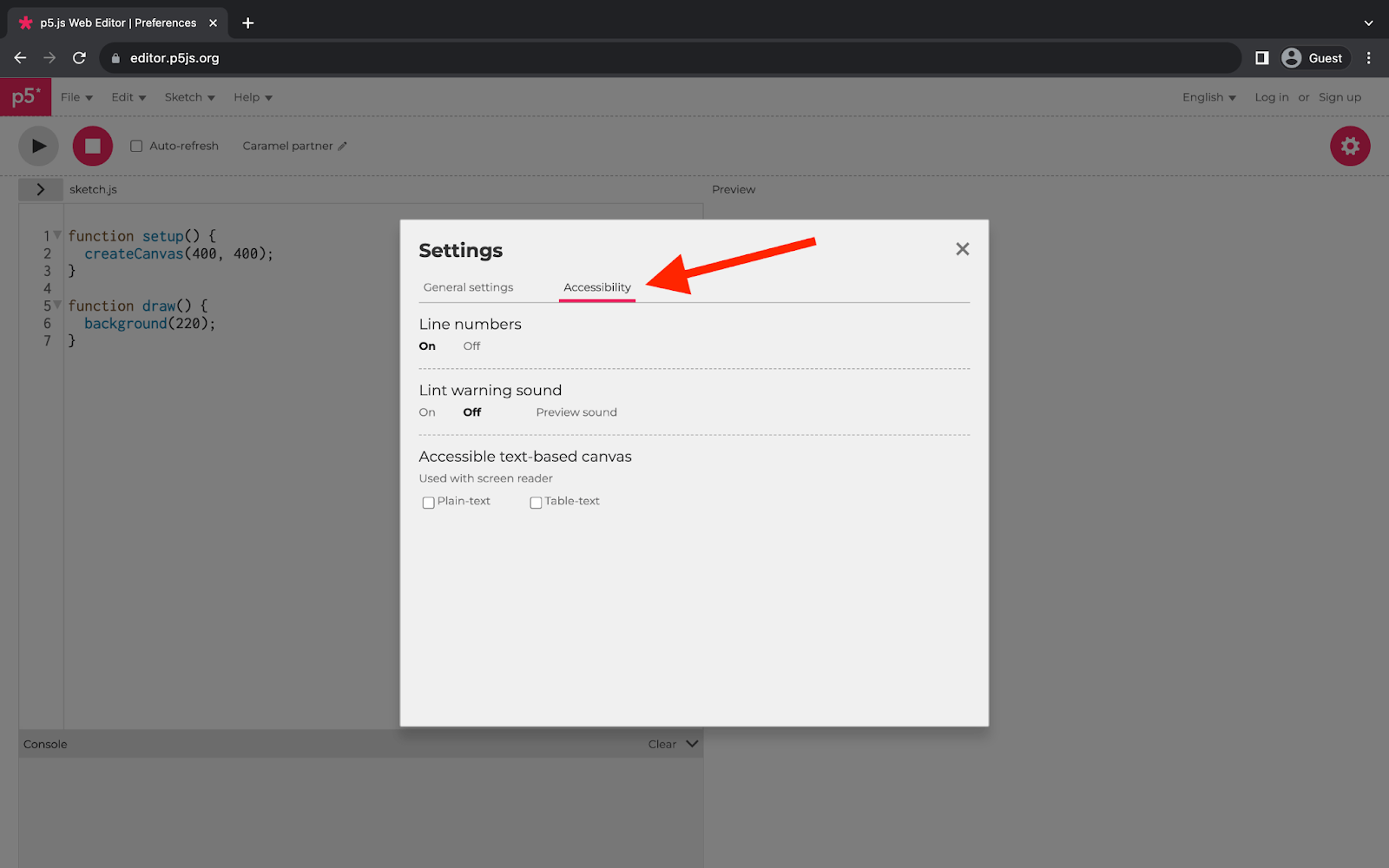 A web browser displaying the p5.js Web Editor. A square menu in the middle of the page displays accessibility settings. A red arrow points to the “Accessibility” tab near the top of the square menu.